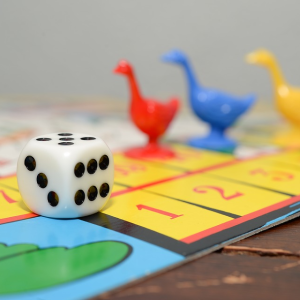 gameboard with dice and plastic ducks