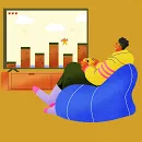 man sitting playing a video game